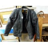 A gent's black leather motorcycle jacket, a pair of brown suede Church's shoes, two pairs of