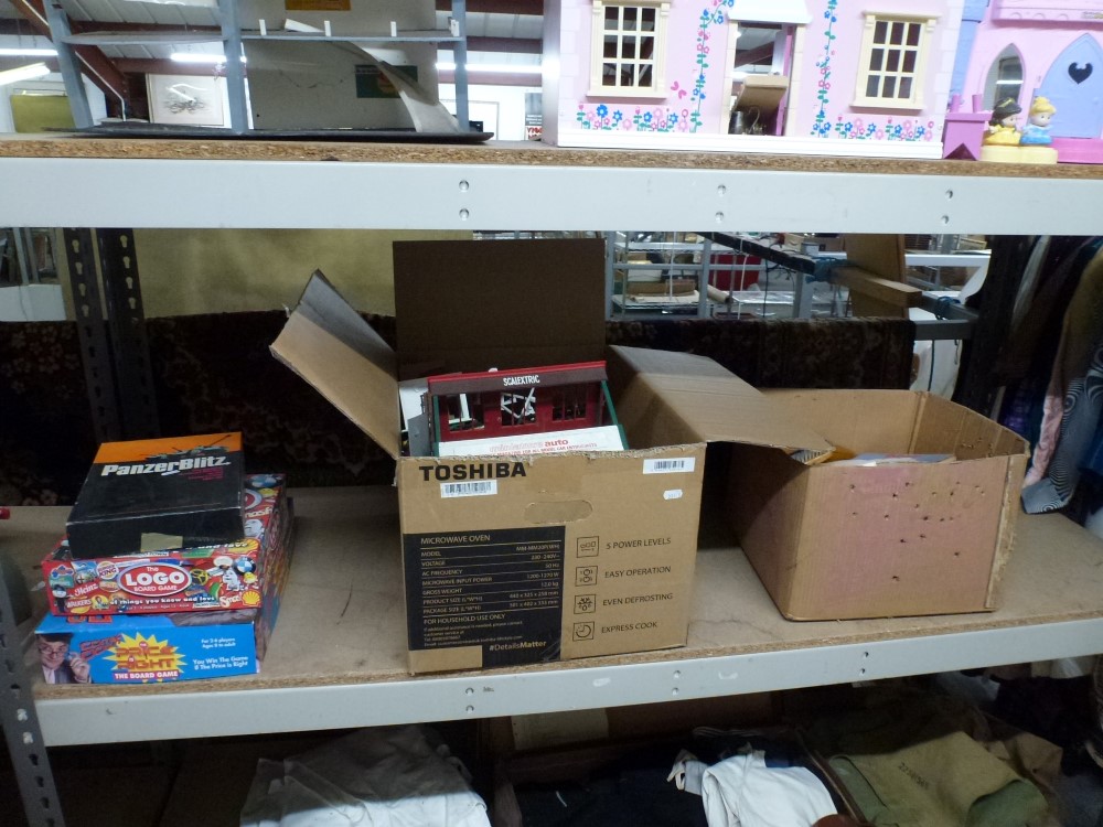 Two shelves of assorted toys including play houses, Scalextric track and accessories, board games - Image 2 of 2