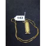 An Egyptian 18 ct gold pendant, on an 18 ct box link chain, 17.8 gm WE DO NOT ACCEPT CREDIT CARDS.
