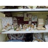 A collection Beswick Beatrix Potter figurines including Hunca Munca, Flopsy Mopsy and Cottontail and
