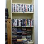 A large quantity of CDs and DVDs including The Audrey Hepburn Collection, Joy Division, Planet