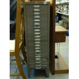 A metal filing cabinet of 21 shallow drawers WE DO NOT ACCEPT CREDIT CARDS. STORAGE IS CHARGED AFTER