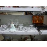 A glass lot including Orrefors glacial style tea light holders, four small Orrefors glasses, a