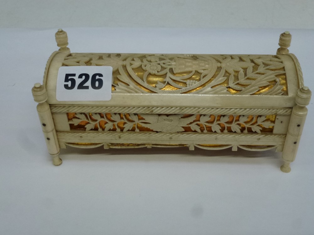 A fine Napoleonic prisoner-of-war bone casket containing a set of dominoes, with sliding lid, carved