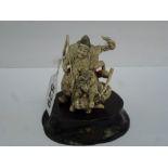 A good Japanese small carving, Meiji period, of two Samurai fighting a snake-tailed devil, signed (