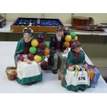 Three Royal Doulton figures: The Old Balloon Seller HN1315; The Balloon Man HN1954; and Silks and
