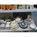 Two shelves of mixed china comprising mainly of tea and dinner wares including a Duchess Glen