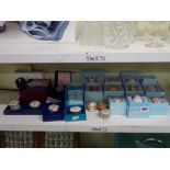 12 Halcyon Days enamel egg trinket boxes and pill boxes plus eight Bilston enamel trinket boxes