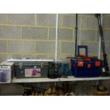 Two shelves of tools and toolboxes including Black & Decker and Bosch, a chrome curtain pole, a