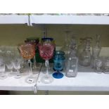 A quantity of glassware including a set of six Bohemian Crystal wine glasses, six decanters and