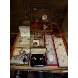 A lot of costume jewellery including crystal and diamante necklaces, a wrist watch, cuff-link set,