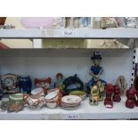 Two shelves of mixed Oriental and other ceramics and ornaments comprising Oriental figurines of