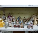 A collection of figurines including two by Royal Doulton, Stephanie HN2807 and Julie HN3878, a
