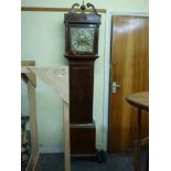 An early 19th century grandfather clock in an oak inlaid case, with swan-neck pediment, the brass