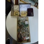 Two cartons of costume jewellery including diamante rings, brooches and necklaces, a Victorian
