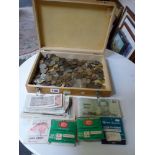 A wooden slide box full of modern currency, mostly foreign, and approximately 43 items of paper