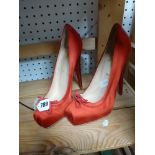 A pair of red satin Christian Louboutin Lolo ballet platform heels with bow, marked 39 [upstairs