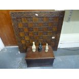 A resin Queen's Beasts chess set in wooden box, and a simulated wood chessboard [under C] WE DO