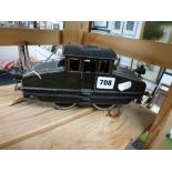 A Marklin O-gauge P.O. E.I. steeple cab rail three rail locomotive in green and black, with electric