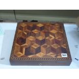 A Regency lap desk, the lid finely veneered in specimen wood trompe l'oeil cube parquetry, 24.7 cm