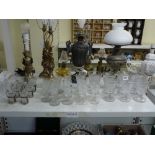 An assembled early 19th century service of drinking glasses, richly cut, comprising: 7 rummers, 4