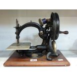 A Willcox & Gibbs sewing machine made in the USA. [s3] WE DO NOT ACCEPT CREDIT CARDS. CLEARANCE