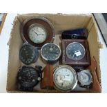 An interesting collection of nine vintage dashboard timepieces and other instruments, comprising: