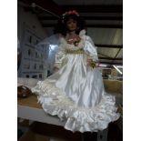 An Alberon 'Claudette' bride doll, a porcelain and cloth-bodied doll 'Libby' by Elaine Campbell, a
