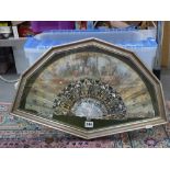 An attractive 19th century French fan, the paper leaf painted with elegant grape harvesters within