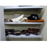 A cowboy lot including three various cowboy hats, four shirts, belts with ornate buckles including