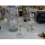 Three items of glass, comprising: an 18th century Continental wine glass, probably Bohemian,