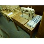 A Singer 401 sewing machine, very modern for its time, offering a choice of stitches with