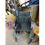 A Days Folding Wheelchair with footrests. WE DO NOT ACCEPT CREDIT CARDS. CLEARANCE DEADLINE IS