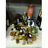 A selection of miniatures including whisky, and a bottle of Robert Cain's Christmas Ale (levels