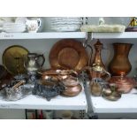 A metalware lot comprising a quantity of copper including serving dishes and covers, a circular