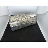 A good late Victorian silver rectangular box, heavily embossed with anthemion, 6 in long, London