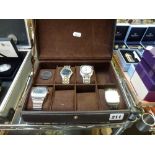 Four stylish modern gentleman's watches by French Connection, Rotary, Police and Accurist in a