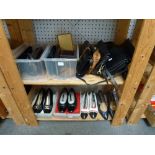 Two shelves of ladies' fashion accessories including three pairs of Chanel pumps, a pair of Bruno