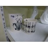 Two Wedgwood mugs designed by Edward Ravilious Alphabet and Gardening Implements. [s54] WE DO NOT