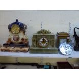 Four mantel timepieces, circa 1900 and later, comprising: an impressive green onyx clock with gong-