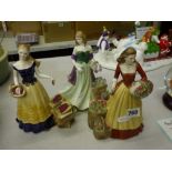 A set of three Royal Worcester porcelain figures of Street Sellers modelled by Tim Perks