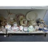 Two shelves of mainly mixed ceramic items including Royal Worcester Red Peony part-tea service,