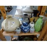 Eight vases and a blue and white ginger jar and cover, vases include Devonware green lustre and