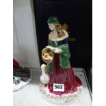 A Royal Worcester figure of Royal Worcester Fruit Seller at the Nottingham Goose Fair, from an