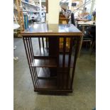 A mahogany revolving book table with inlaid top. WE DO NOT ACCEPT CREDIT CARDS. CLEARANCE DEADLINE