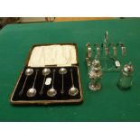 English silver, comprising: a five-bar toast rack, Sheffield 1934, two pepperettes, and a cased