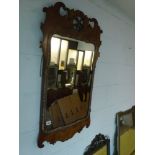 An early 19th century rectangular fretwork mirror with griffin surmount. WE DO NOT ACCEPT CREDIT
