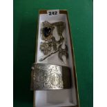 A silver card case with scrolling engraved decoration, a pair of marcasite 925 silver dress clips