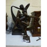A modern bronze figure of a dancer in Art Deco style, and a resin bronze figural lamp, also in Art
