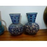 Two Multan pottery vases, probably circa 1900, each painted with flowers in blue and turquoise and